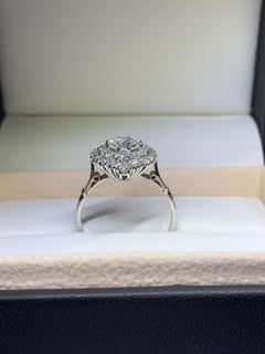 2.20ct round diamond antique engagement ring in platinum.