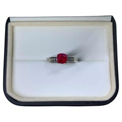 2.20ct Ruby and baguette diamond engagement ring in platinum.