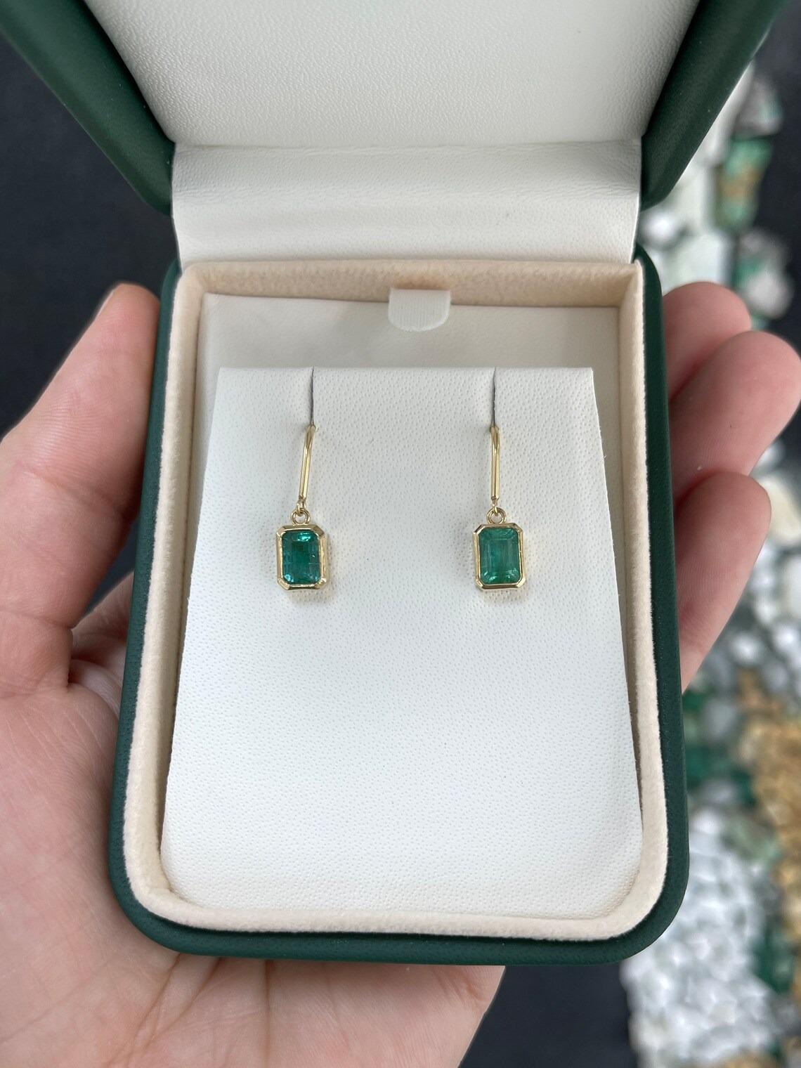 2.20tcw 14K Classic Emerald Cut Emerald Bezel Set Gold Dangle Earrings In New Condition For Sale In Jupiter, FL