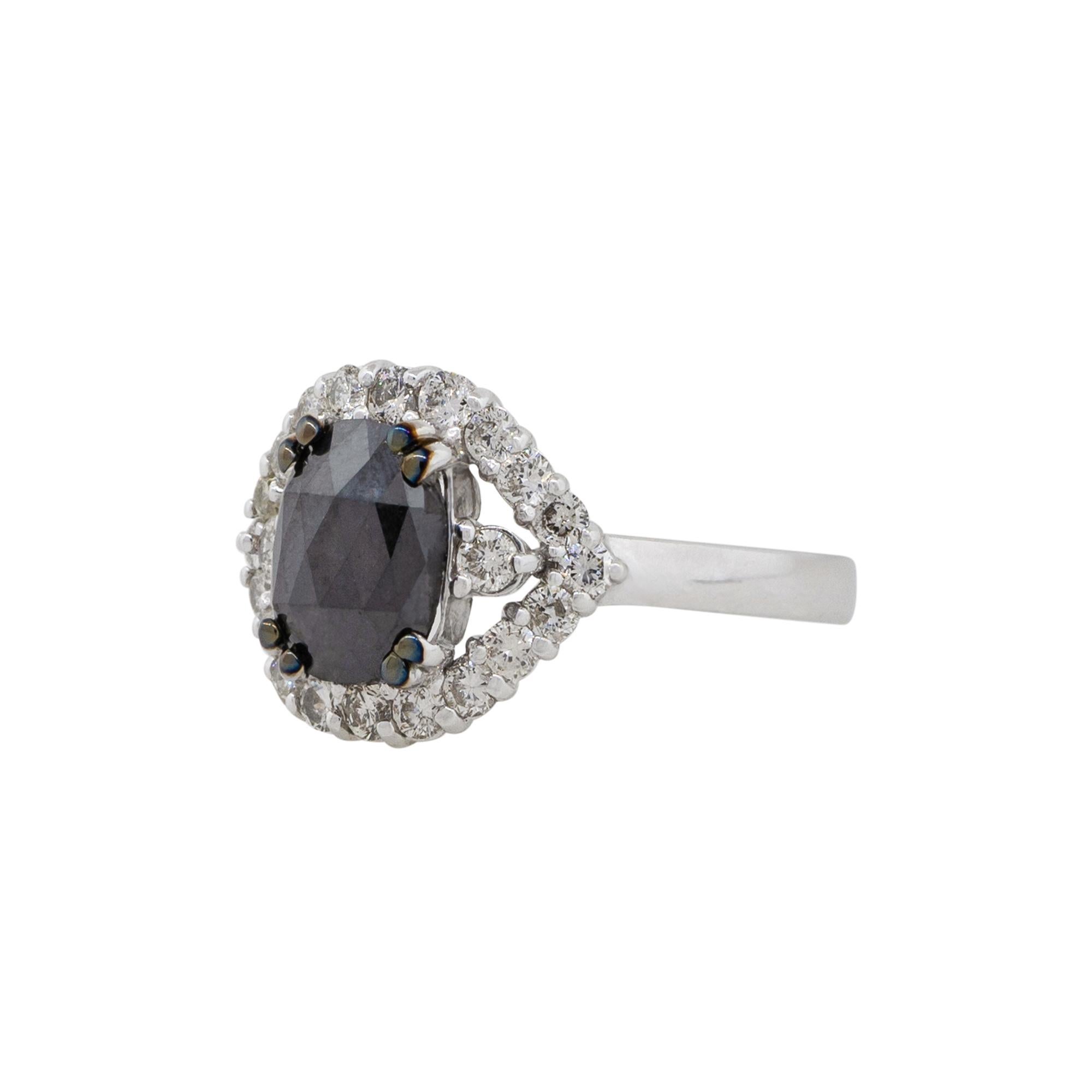 Material: 18k White Gold
Diamond details: Approx. 1.48ctw cushion shaped Diamond. Diamond is Fancy Black in color and VS in clarity
                             Approx. 0.73ctw of round cut Diamonds. Diamonds are H in color and VS in clarity
Size: