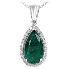NO RESERVE - 2.21ct Emerald 
0.18 Ct Diamonds, 14K White Gold Pendant