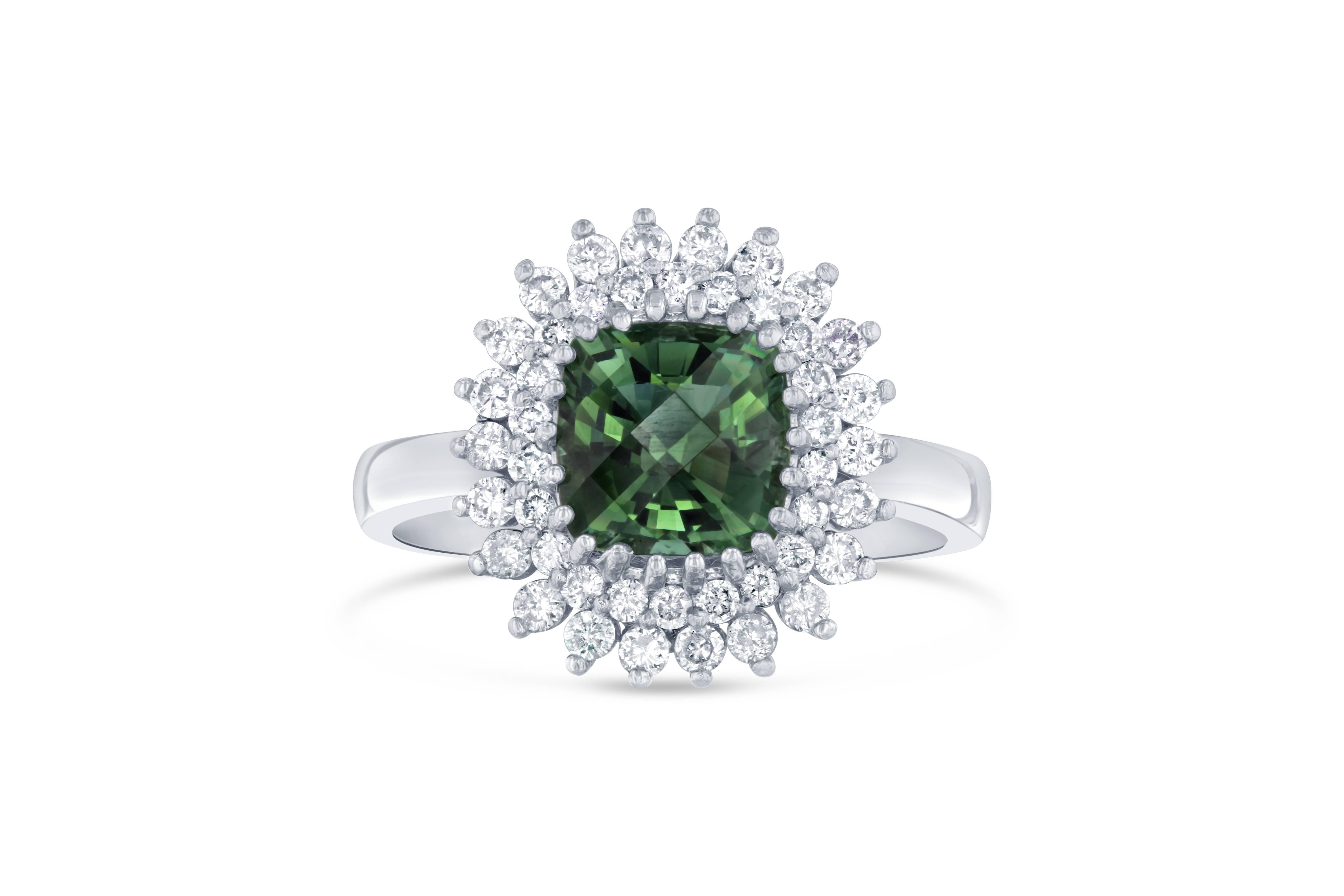 This ring has a mesmerizing Asscher cut Green Tourmaline weighing 1.67 Carats and 44 Round Cut Diamonds weighing 0.54 Carats. The total carat weight of the ring is 2.21 Carats. 
It is set in 14K White Gold and weighs approximately 4.5 grams. 
The