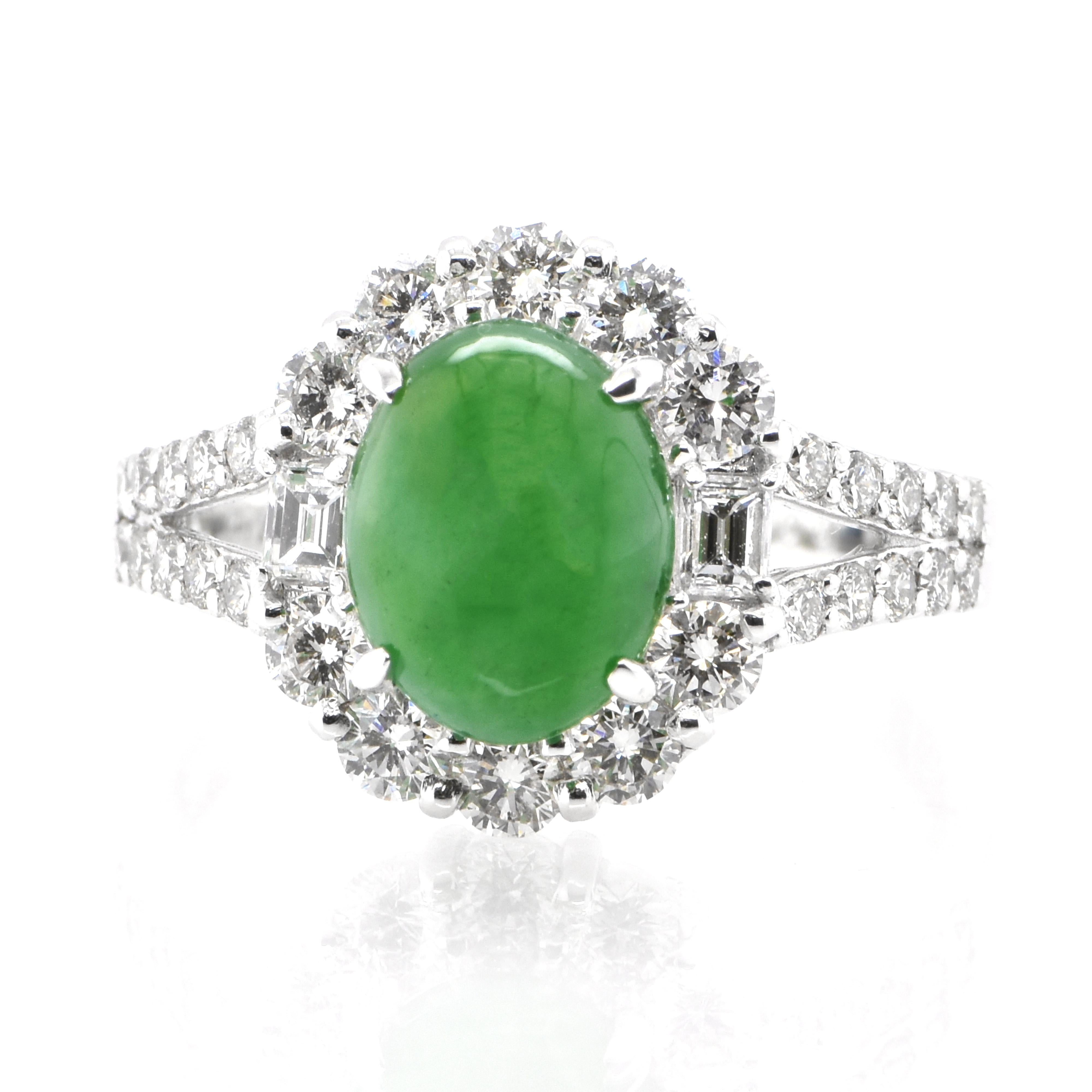 A beautiful Ring featuring a 2.21 Carat, Natural, Non-dyed Jadeite and 0.95 Carats of Diamond Accents set in Platinum. Jadeite has been cherished for millennia. Its nature is pure and enduring, yet sensuous and luxurious. Jadeite’s exceptional look