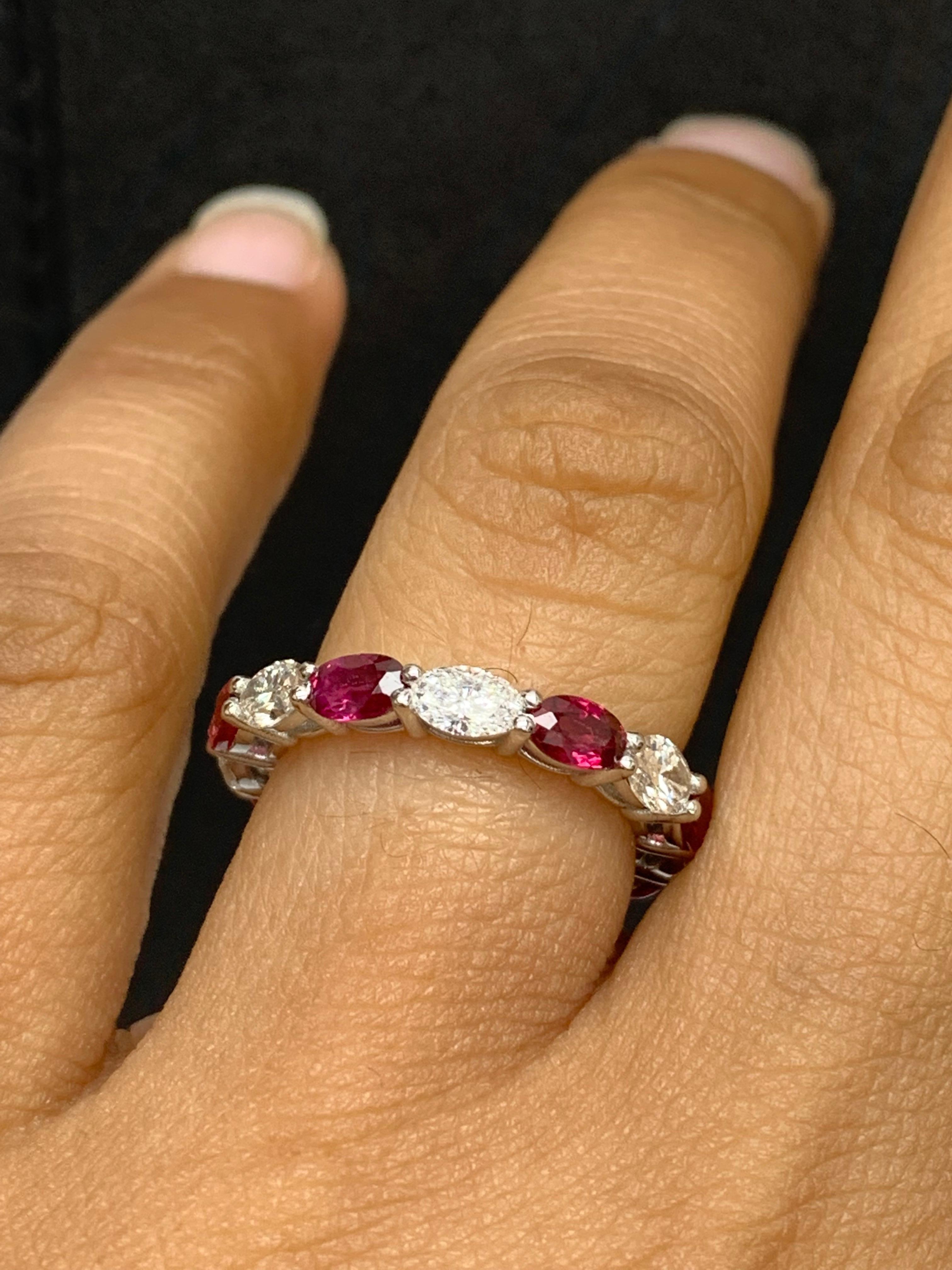 Contemporary 2.21 Carat Oval Cut Ruby and Diamond Eternity Band in 14K White Gold For Sale