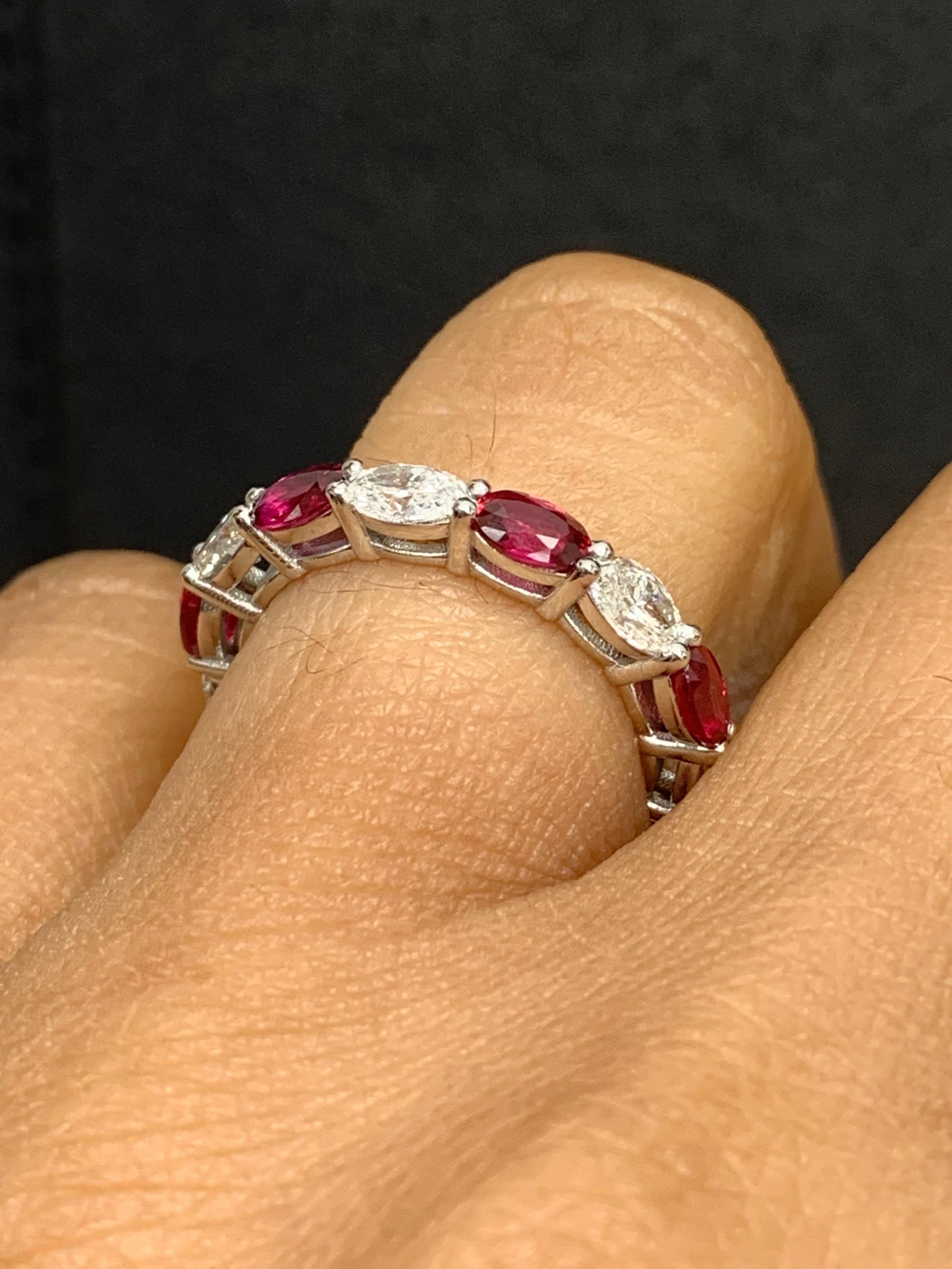 2.21 Carat Oval Cut Ruby and Diamond Eternity Band in 14K White Gold In New Condition For Sale In NEW YORK, NY
