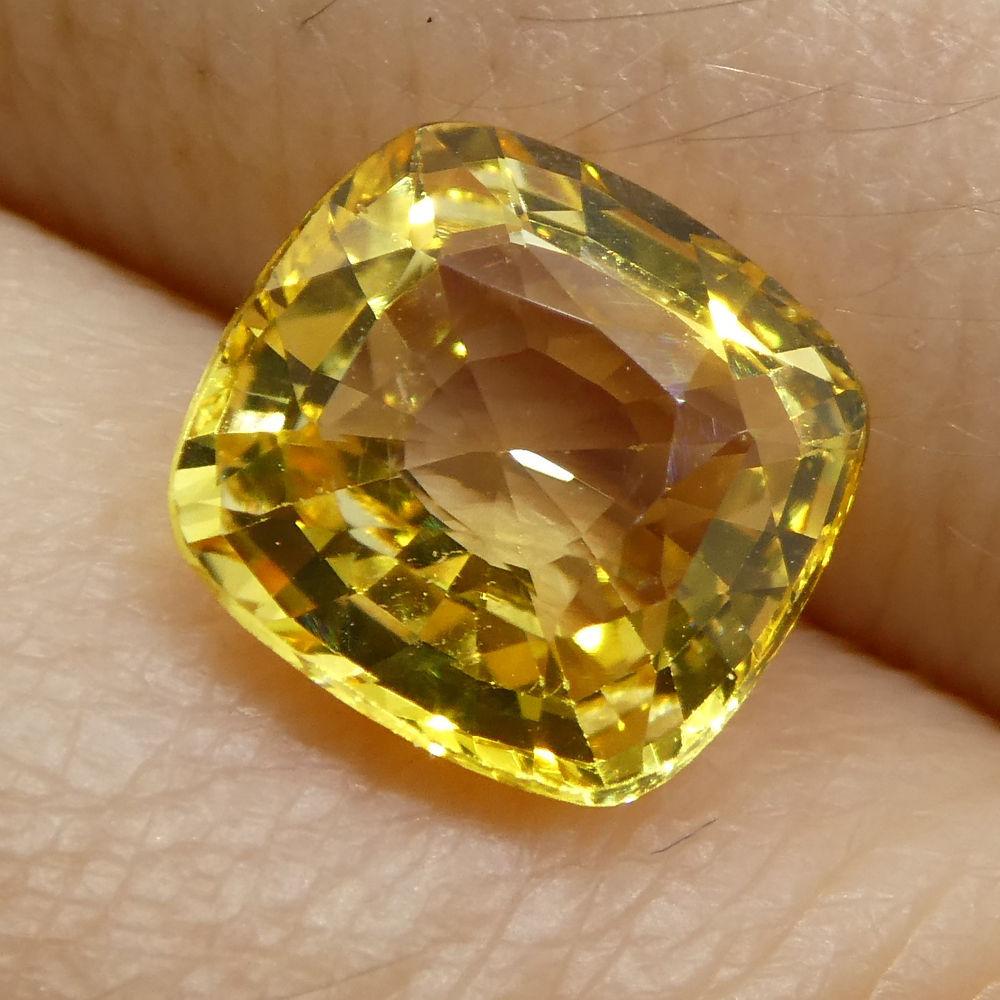 Description:

Gem Type: Yellow Sapphire 
Number of Stones: 1
Weight: 2.21 cts
Measurements: 7.71x7.47x3.85 mm
Shape: Cushion
Cutting Style Crown: Modified Brilliant Cut
Cutting Style Pavilion: Step Cut 
Transparency: Transparent
Clarity: Very Very
