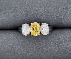 2.21 ct GIA Certified Three-Stone Oval Yellow & White Diamond Ring