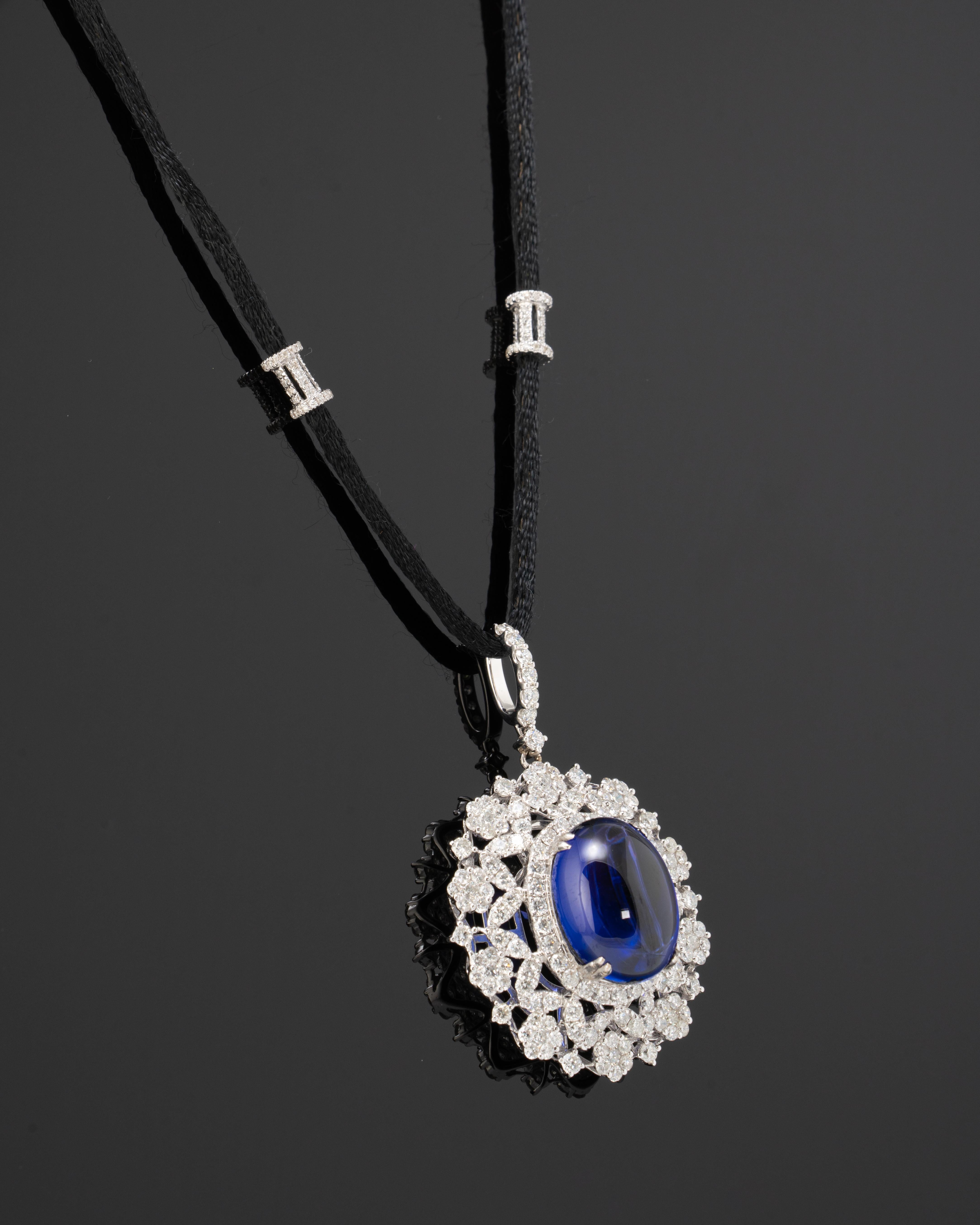 Art Deco 22.12 Carat Tanzanite Cabochon and Diamond Pendant Necklace For Sale