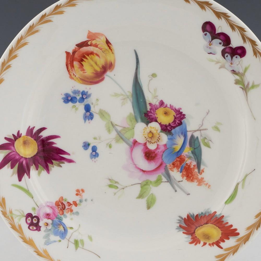 22121706 Swansea Porcelain Dessert Plate By Henry Morris, c1816

Additional information:
Date : 1815-1817
Period : George III
Marks : none
Origin : Swansea, South Wales
Colour : polychrome and gilt on white grounds
Pattern : large central spray with