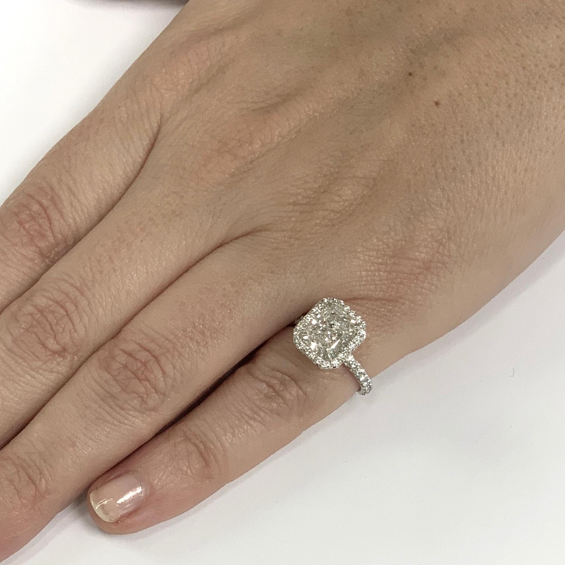 2.21 Carat Conflict Free GIA Certified GVS2 Radiant Cut Diamond Halo Ring In New Condition For Sale In New York, NY