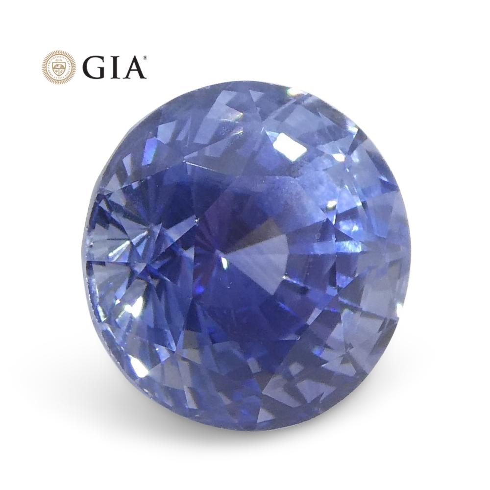 This is a stunning GIA Certified Sapphire 

The GIA report reads as follows:

GIA Report Number: 2221292371
Shape: Round
Cutting Style: 
Cutting Style: Crown: Modified Brilliant Cut
Cutting Style: Pavilion: Step Cut
Transparency: Transparent
Color: