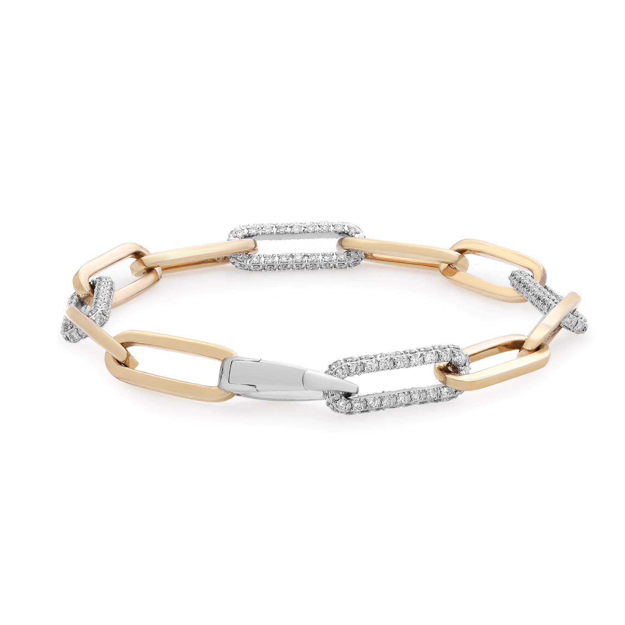 This trendy and chic bracelet features paper clip links crafted in 14k yellow gold with alternate diamond studded paper clip links crafted in 14k white gold. Total diamond weight: 2.21 carats. Diamond quality: color G-H and clarity VS-SI. Bracelet