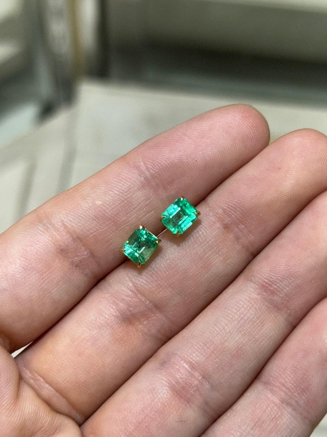 Modern 2.21tcw 18K Colombian Emerald Cut Studs Vivid Green Four Prong Set 750 Gold For Sale