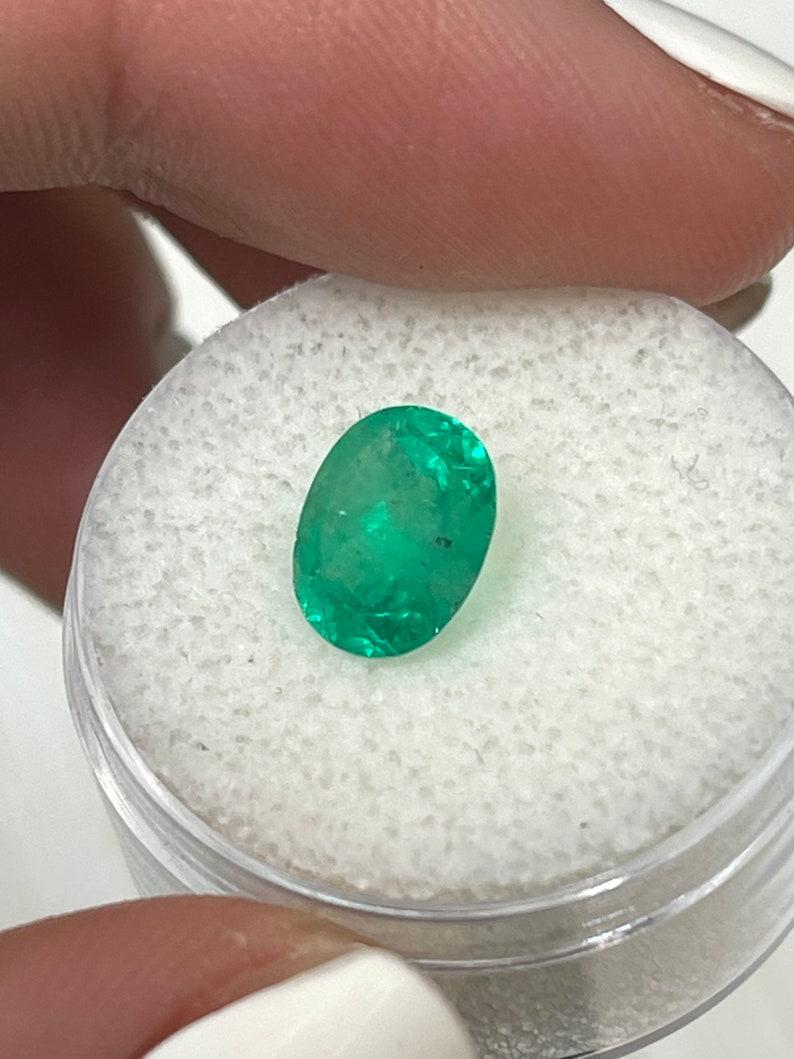 Modern 2.22 Carat 9x8 Glowy Green Colombian Emerald - Oval Cut May Birthstone Gem For Sale