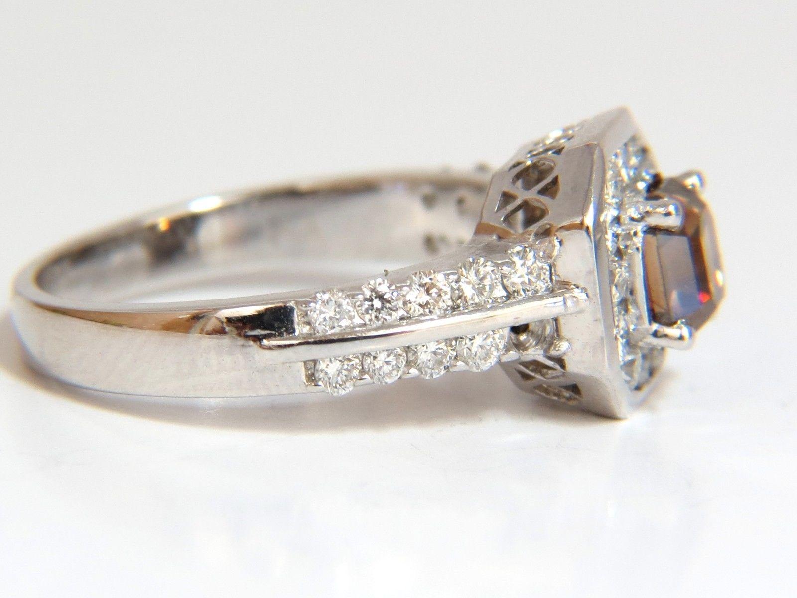Sparkling Golden Browns Flash Fancy color Ascher cut Diamond ring.

Natural Fancy color Center diamond: 1.10ct. 

Asscher Cut

5.6 X 5.3mm

Vs-2 clarity

1.21ct. Side rounds diamonds:

G-color Vs-2 clarity.

14kt. white gold

4.4 grams.

current