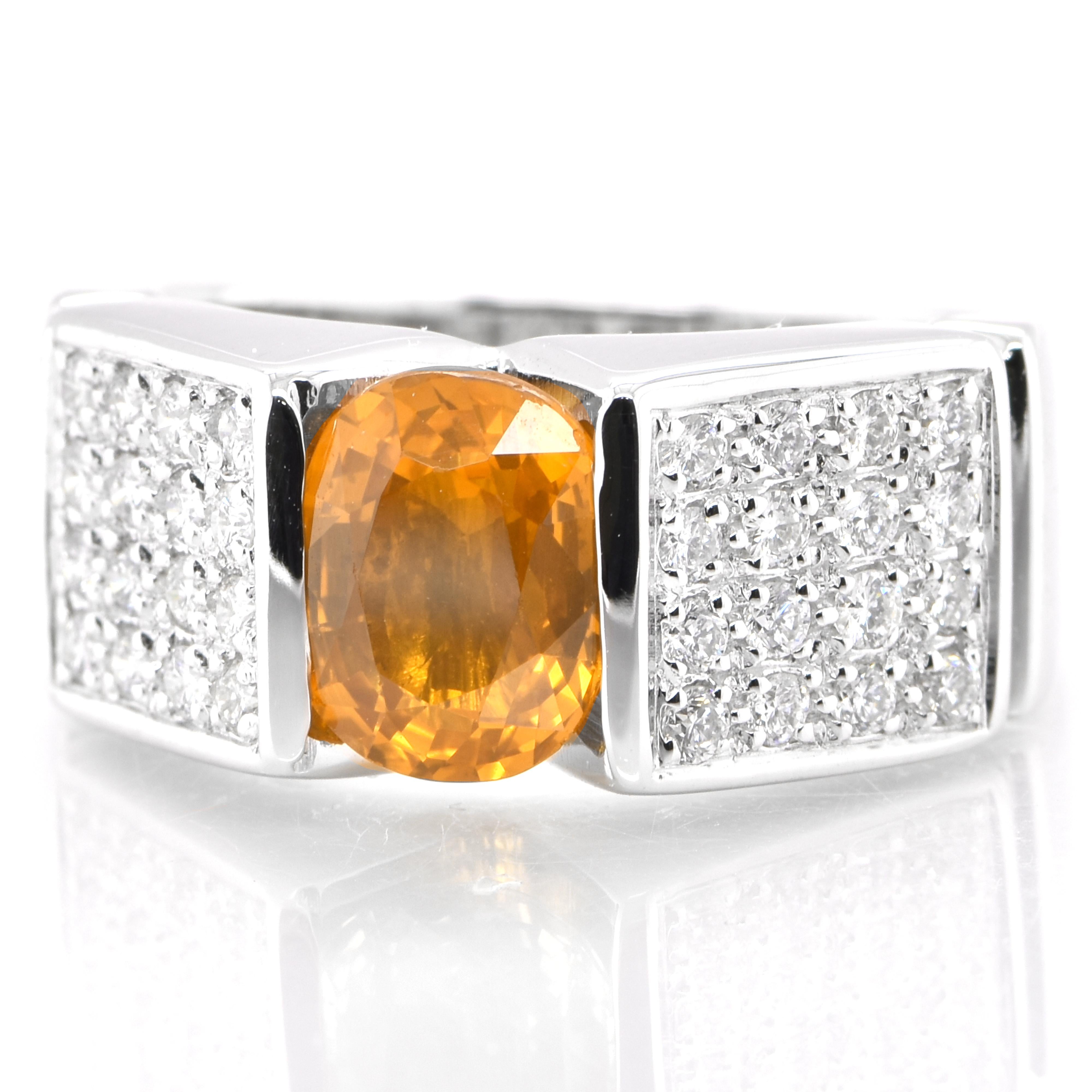 A stunning ring featuring a 2.22 Carat Natural Yellow Sapphire and 0.46 Carats of Diamond Accents set in 18 Karat Gold. Sapphires have extraordinary durability - they excel in hardness as well as toughness and durability making them very popular in