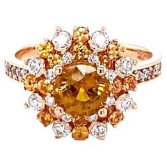 Used 2.22 Carat Orange Sapphire Diamond 18 Karat Rose Gold Bridal Ring