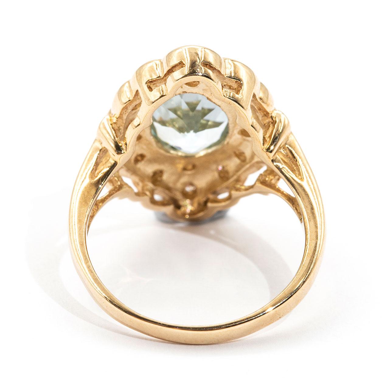 2.22 Carat Oval Aquamarine and Diamond Halo Cluster 9 Carat Yellow Gold Ring In Excellent Condition In Hamilton, AU