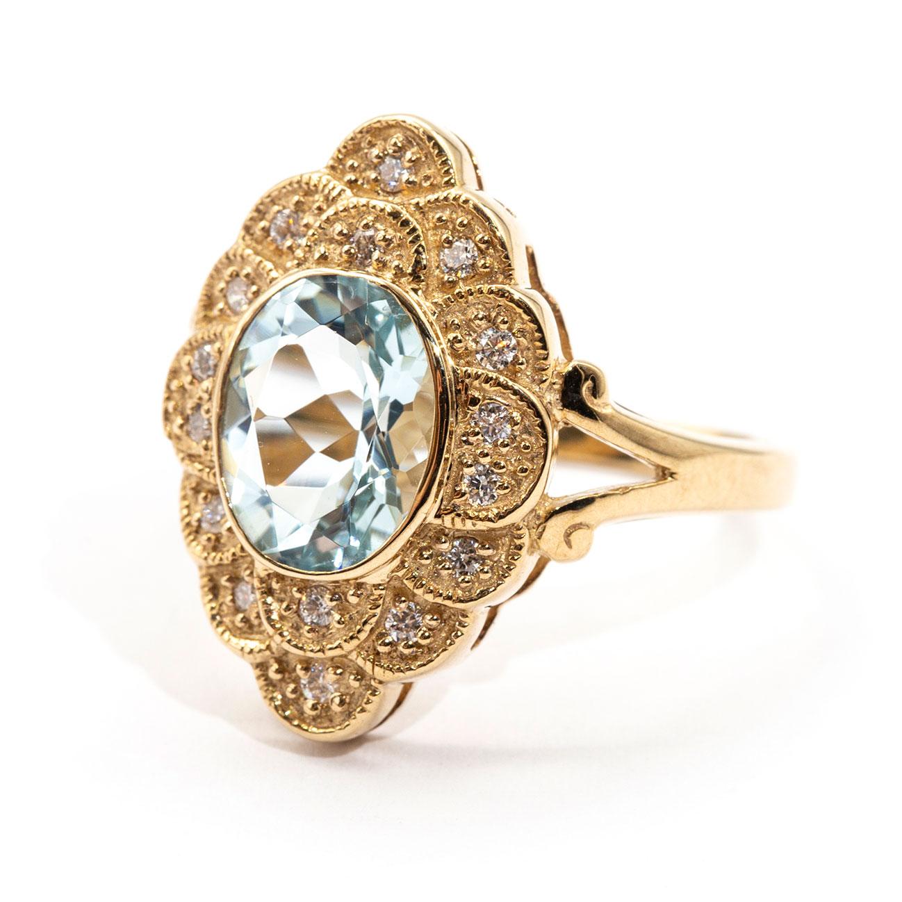 2.22 Carat Oval Aquamarine and Diamond Halo Cluster 9 Carat Yellow Gold Ring 1