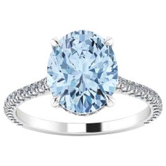 Acquamarina blu ovale da 2,5 carati e diamanti bianchi in pavé in platino