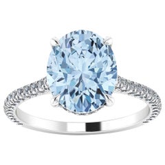 2.5 carat Oval Blue Aquamarine and White Diamonds Pave' in Platinum