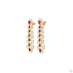 Boucles d'oreilles en or rose avec un diamant rond taille brillant de 2,22 carats