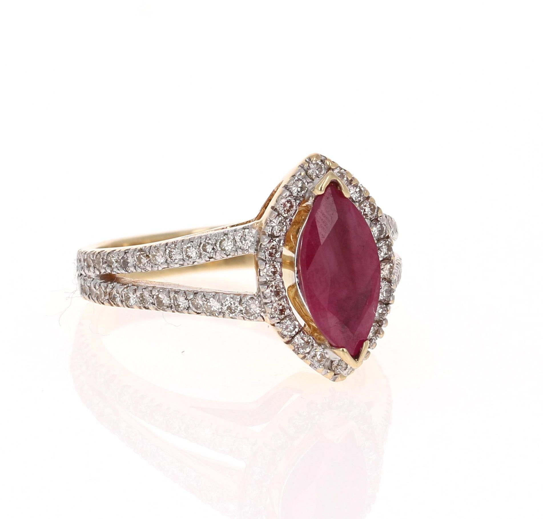 This is simply a beautiful Marquise Cut Ruby and Diamond ring. The Marquise Cut Ruby measures at 6 mm x 12 mm and weighs 1.52 Carats. It is surrounded by 78 Round Cut Diamonds that weigh 0.70 Carats. (Clarity: VS, Color: H) The total carat weight of