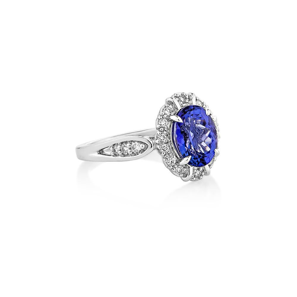 This collection features a selection of the most tantalizing Tanzanite. Uniquely designed with rounds diamonds. The rich purple-blue hues of this gemstone with diamonds set in white gold to present a rich and regal look. 
  
Tanzanite Fancy Ring in