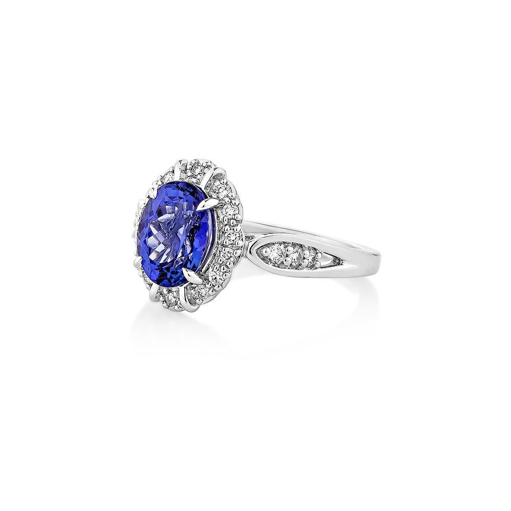 Oval Cut 2.22 Carat Tanzanite Fancy Ring in 18Karat White Gold with Diamond. For Sale