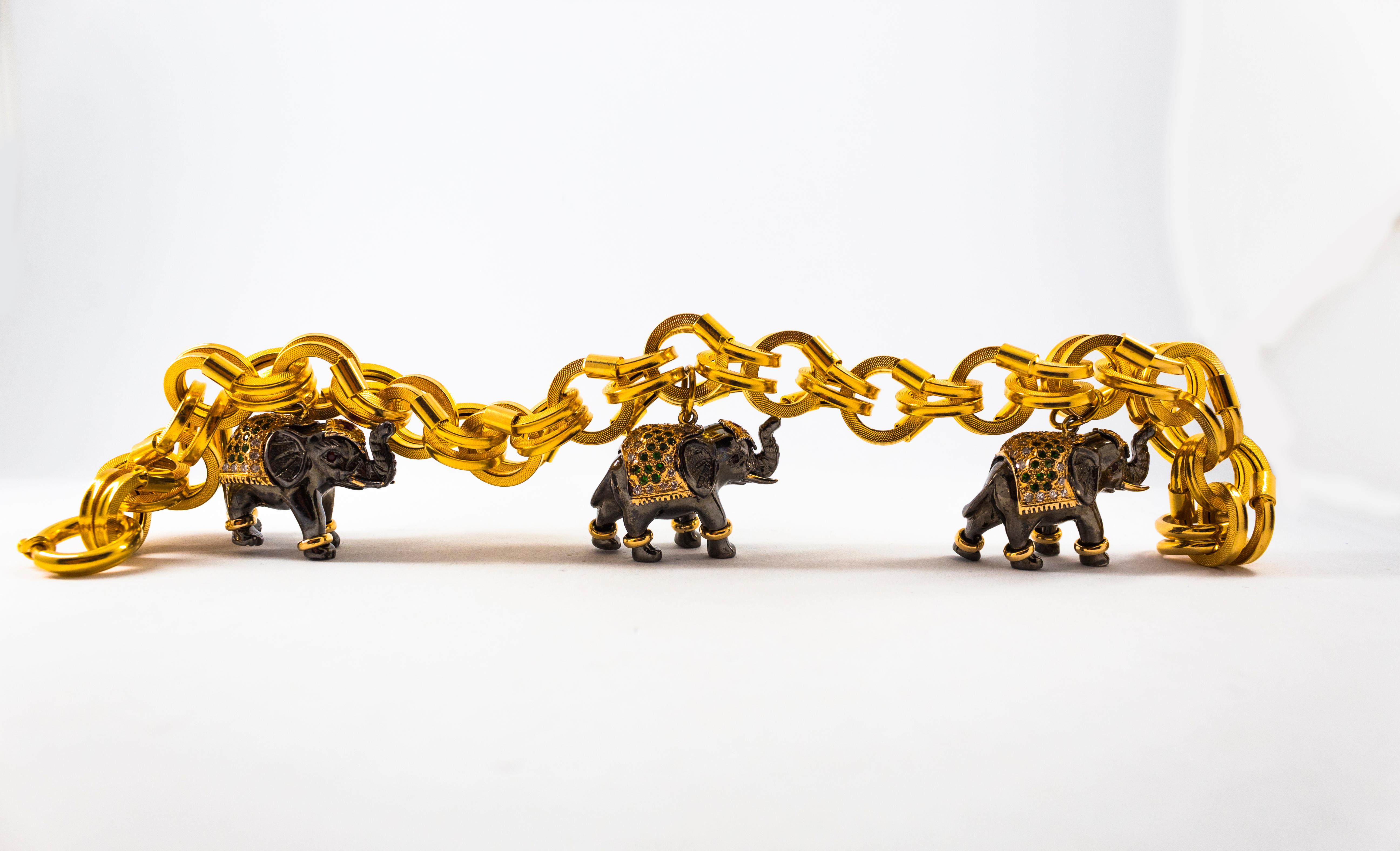 The Bracelet is made of 18K Yellow Gold.
The Weight of the Bracelet is 36.10g.
The Elephants are made of 14K Yellow Gold and Sterling Silver.
This Bracelet has 1.02 Carats of White Diamonds.
This Bracelet has 1.20 Carats of Rubies and