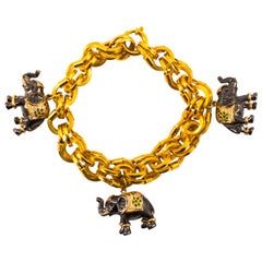 2.22 Carat White Diamond Ruby Tsavorite Yellow Gold "Elephants" Charm Bracelet