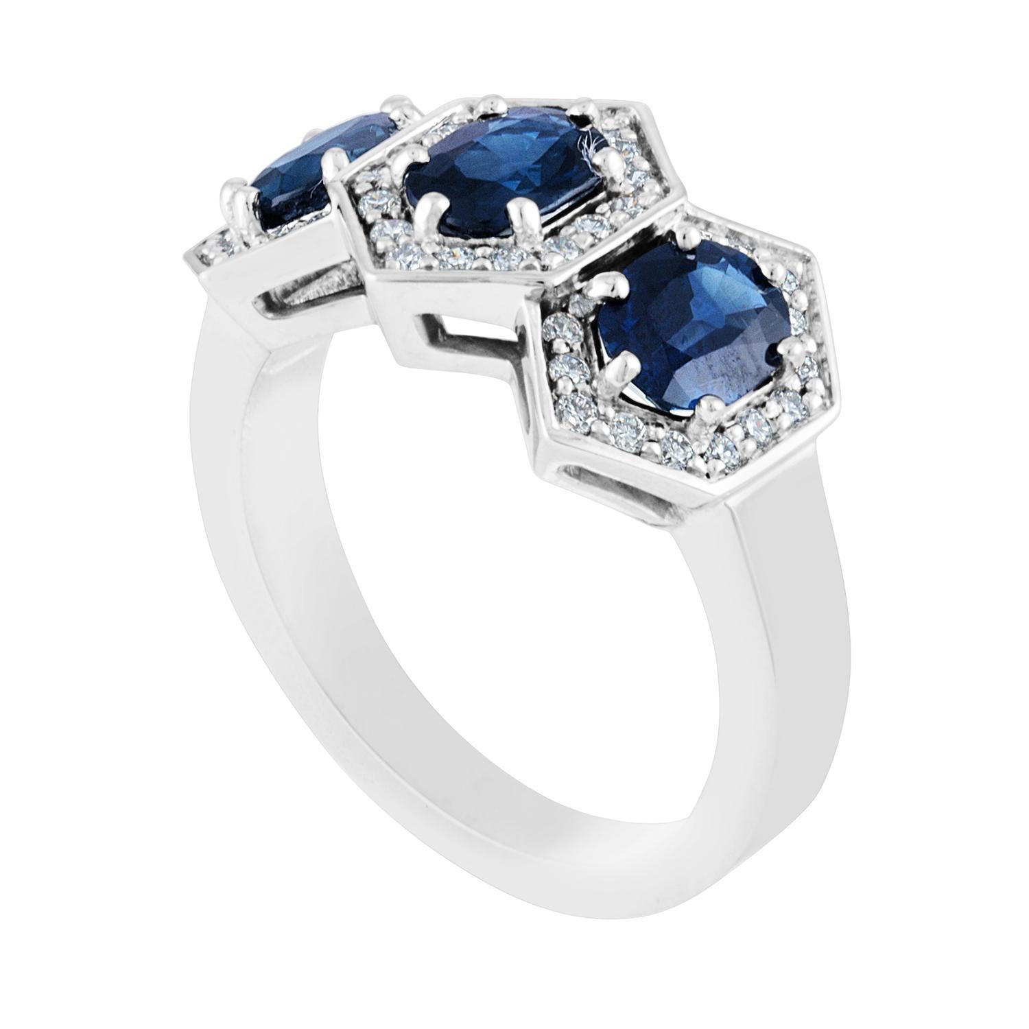 Three Stone Hexagon Band Ring
The ring is 14K White Gold
The ring has 3 Oval Sapphires 2.22 Carats
The ring has 0.30 Carats Diamonds F/G VS
The ring is a size 6.75, sizable.
The ring weighs 6.4 grams