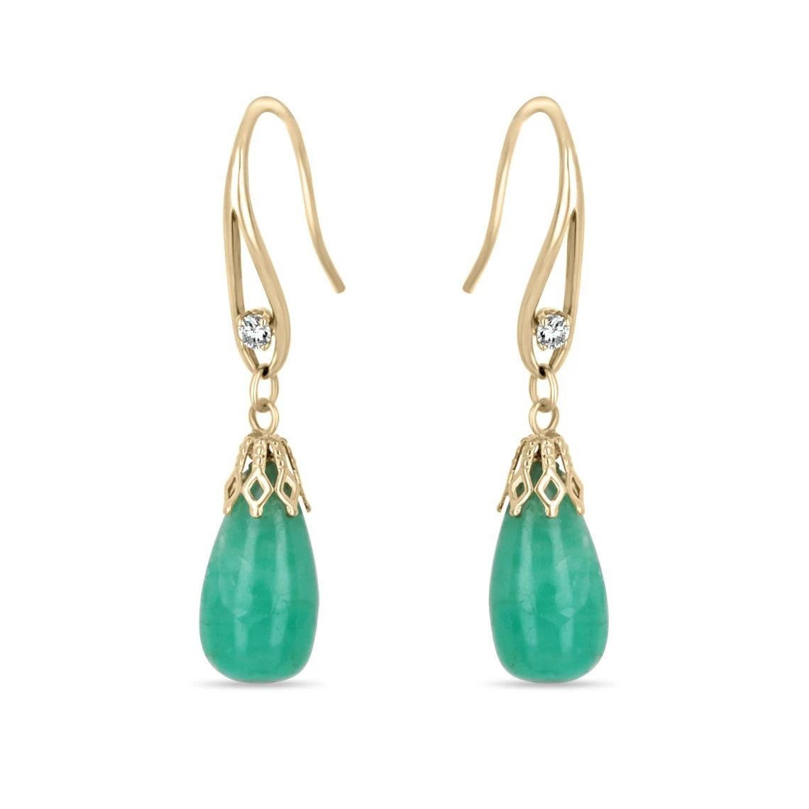 A pair of 14K Solid Gold, French Hook Earrings, features dangling briolette cabochon shaped Natural Colombian Emeralds. Stylish, easy to wear and they easily slide into place. The yellow gold hook is accented with a flawless diamond. Its style adds