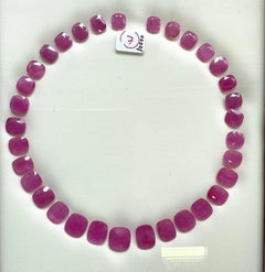 222.27 carats ruby Mozambique cut stone cushion 33 Pieces layout heated natural