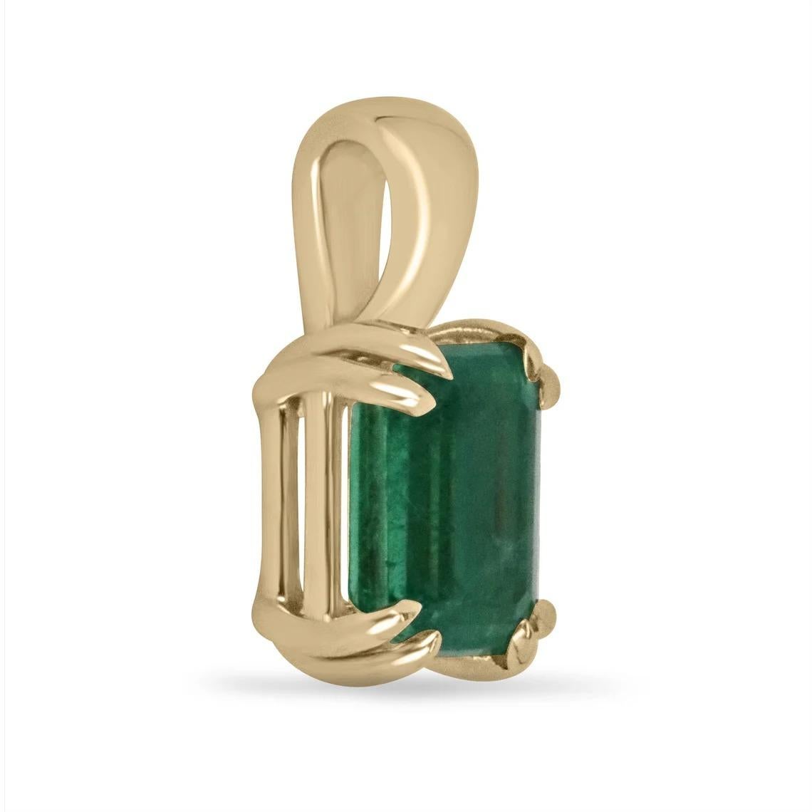 Featured is an absolutely stunning, and one-of-a-kind natural emerald pendant. The gemstone is a natural, 2.22-carat, Zambian emerald cut emerald with ravishing characteristics such as its luminous vivid green color, excellent transparency, luster,
