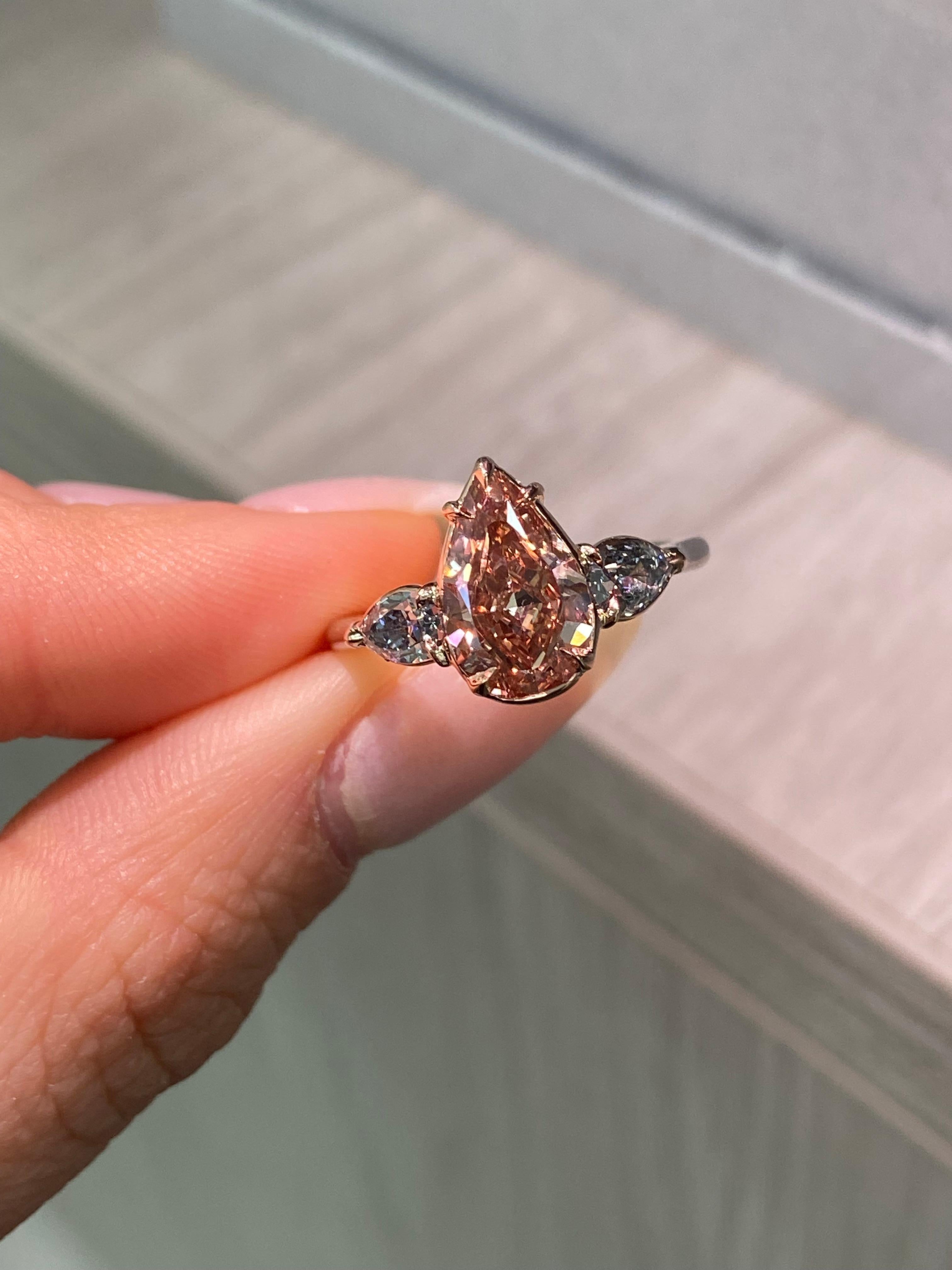 2.22ct Fancy Deep Brown-Pink Pear Diamond with Blue Diamonds Three Stone Ring In New Condition For Sale In New York, NY