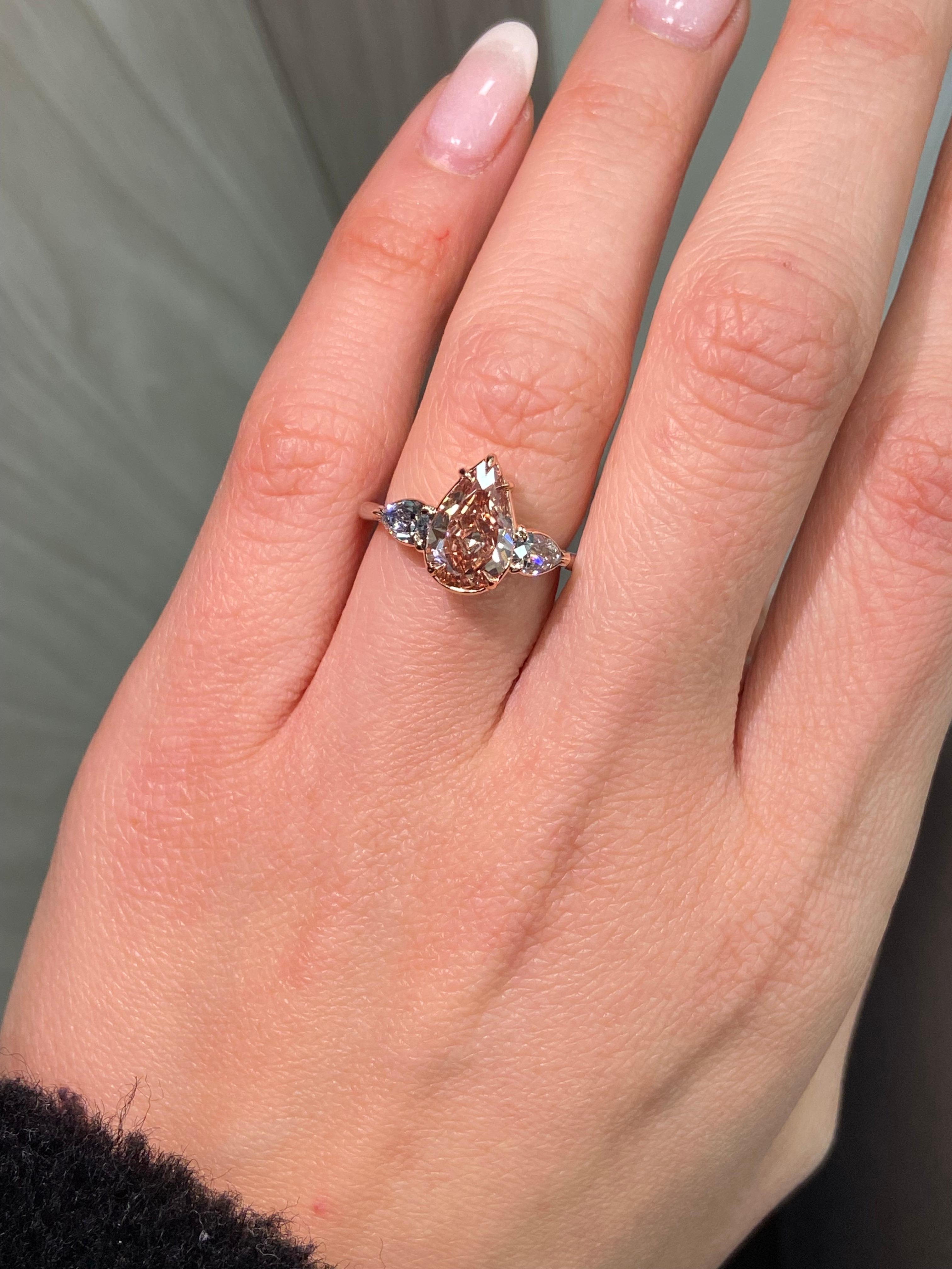 Women's 2.22ct Fancy Deep Brown-Pink Pear Diamond with Blue Diamonds Three Stone Ring For Sale