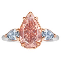 2.22ct Fancy Deep Brown-Pink Pear Diamond with Blue Diamonds Three Stone Ring