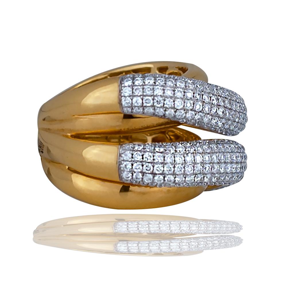 This ladies diamond wedding ring has over one hundred round brilliant diamonds.  The diamonds exhibit a color and clarity of F-G VS.  The diamonds are set in a pave' style and total over 2.22ctw.  This ring is cast from 18k yellow and 18k white gold