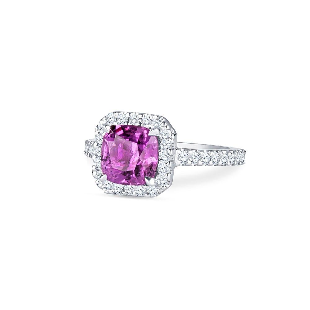 2.23 Carat AGL certified, cushion cut no heat pink sapphire set in center of platinum diamond halo ring. 0.53 Carat total weight of prong-set round brilliant diamonds. Ring size 4.75, may be adjusted larger or smaller upon request. 

Sapphire