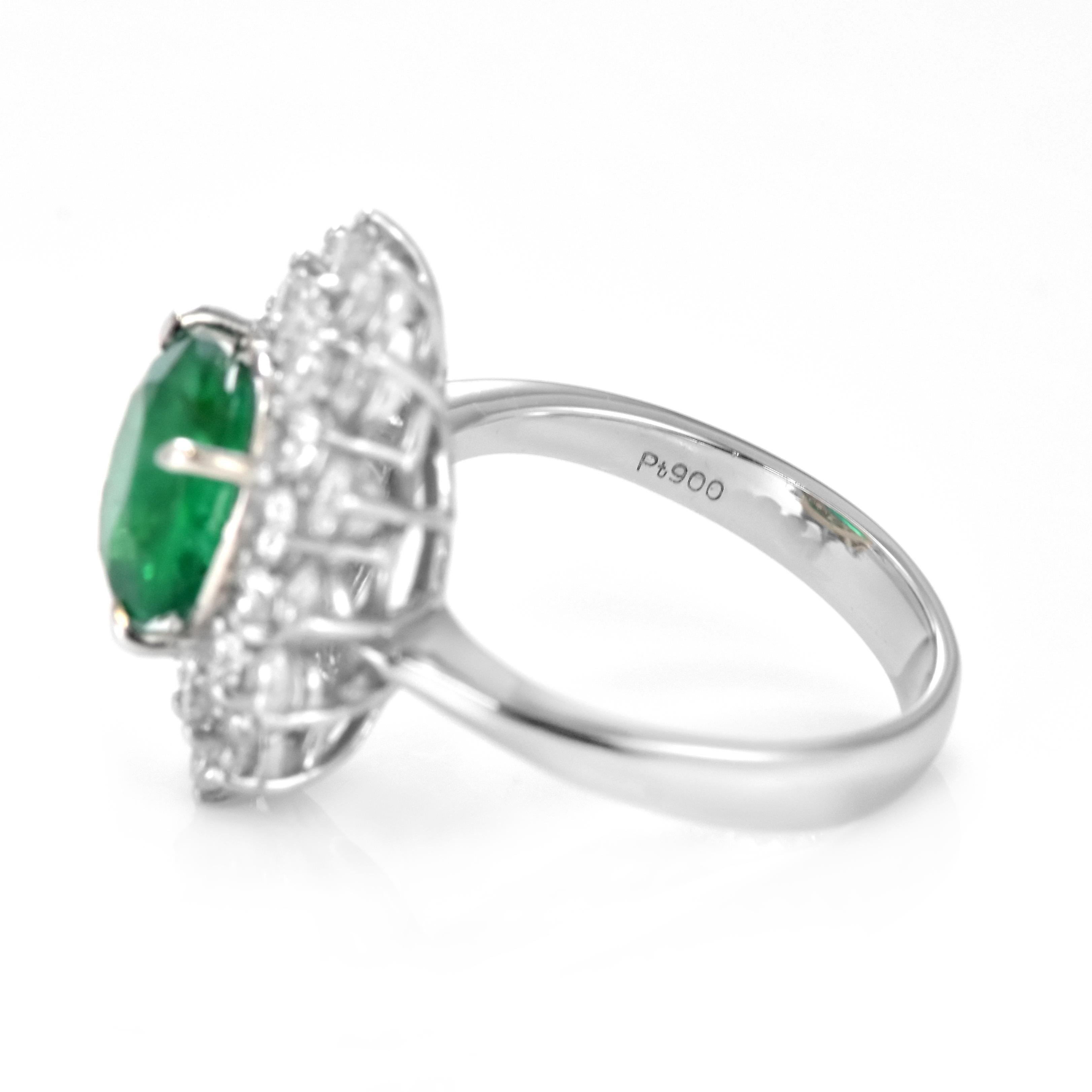 2.23 Carat Natural Round-Cut Emerald and Diamond Ring Made in Platinum For Sale 7