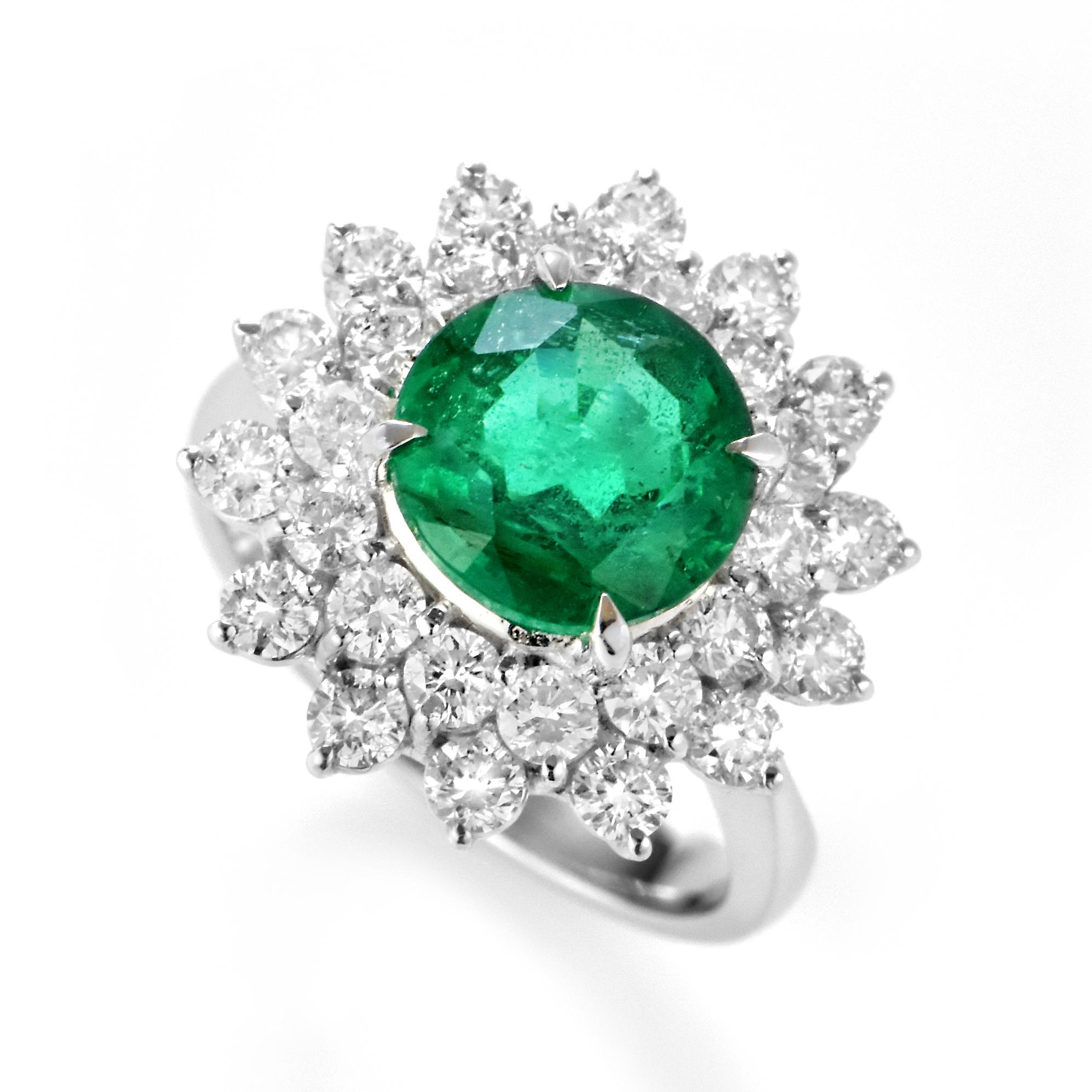 A stunning ring featuring a 2.23 Carat Natural Emerald and 1.46 Carats of Diamond Accents set in Platinum. People have admired emerald’s green for thousands of years. Emeralds have always been associated with the lushest landscapes and the richest