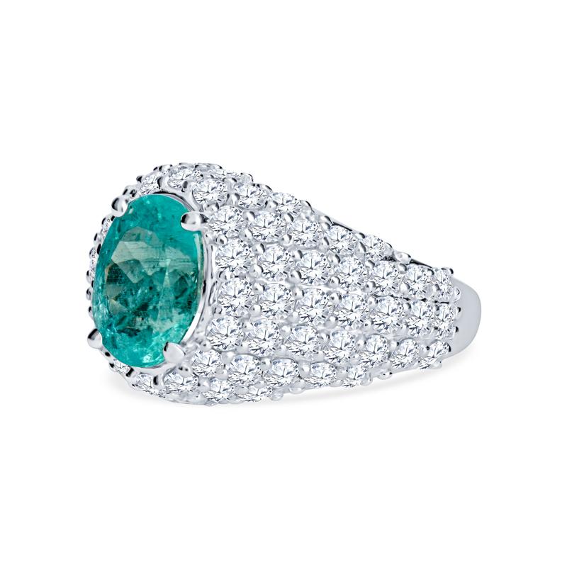 Adorn your finger with this exquisite ring featuring a 2.33ct oval cut green-blue Brazilian Paraiba tourmaline complemented by 2.50 carats of round brilliant cut natural diamonds. Crafted in luxurious 18 karat white gold, this piece combines