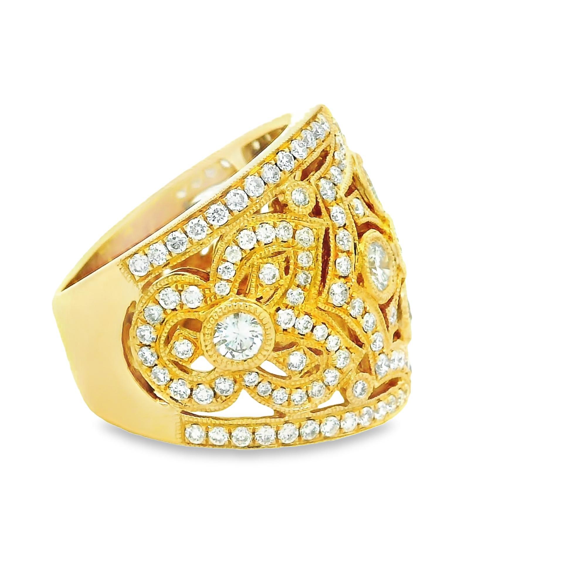 This beautiful band ring will mesmerize your eyes with its lovely antique design! Round brilliant-cut diamonds, totaling 2.23 carats, are placed around the piece in lines, curves, and geometric patterns in classic antique style. The diamonds are all