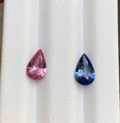2.23 cts, Certified Faceted blue pink Sapphires Pair