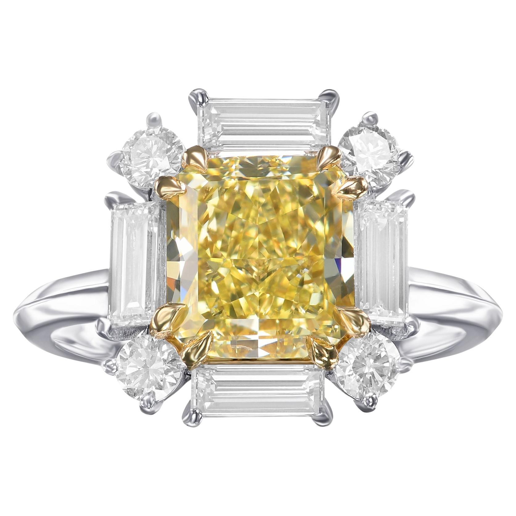 2.23 cts GIA Certified Fancy Yellow Cushion Halo Diamond Ring