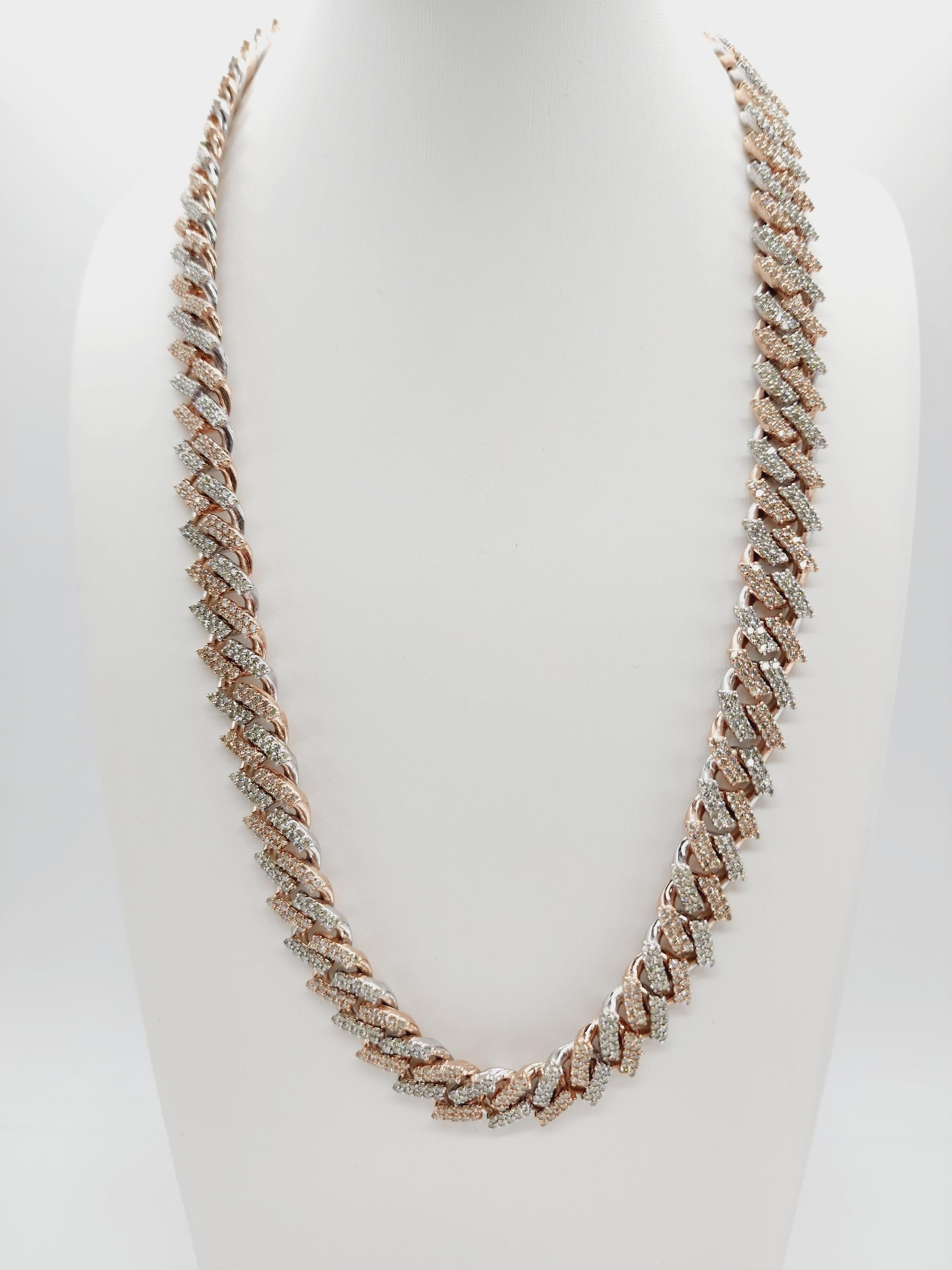 22.30 Carats Total Weight Heavy Gold Cuban Necklace Chain 14 Karats Rose Gold
Two Tone Rose and White Gold
22 inch, 12 mm wide, Average Color I, Clarity SI, Natural Diamonds. 
