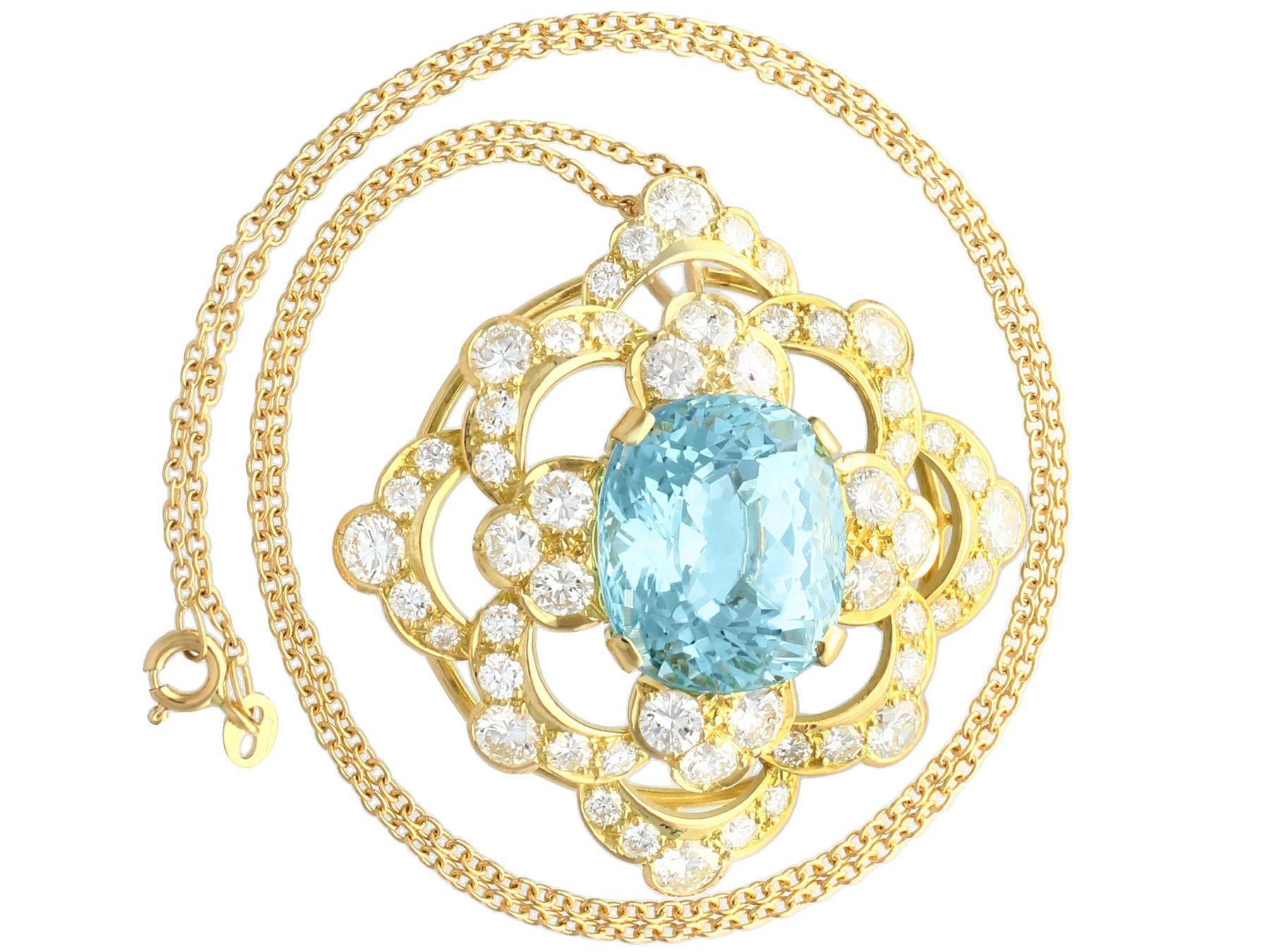 A stunning, fine and impressive vintage 22.32 carat aquamarine, 7.62 carat diamond and 18k yellow gold necklace; part of our diverse vintage jewelry and estate jewelry collections.

This stunning, fine and impressive, large gold aquamarine pendant