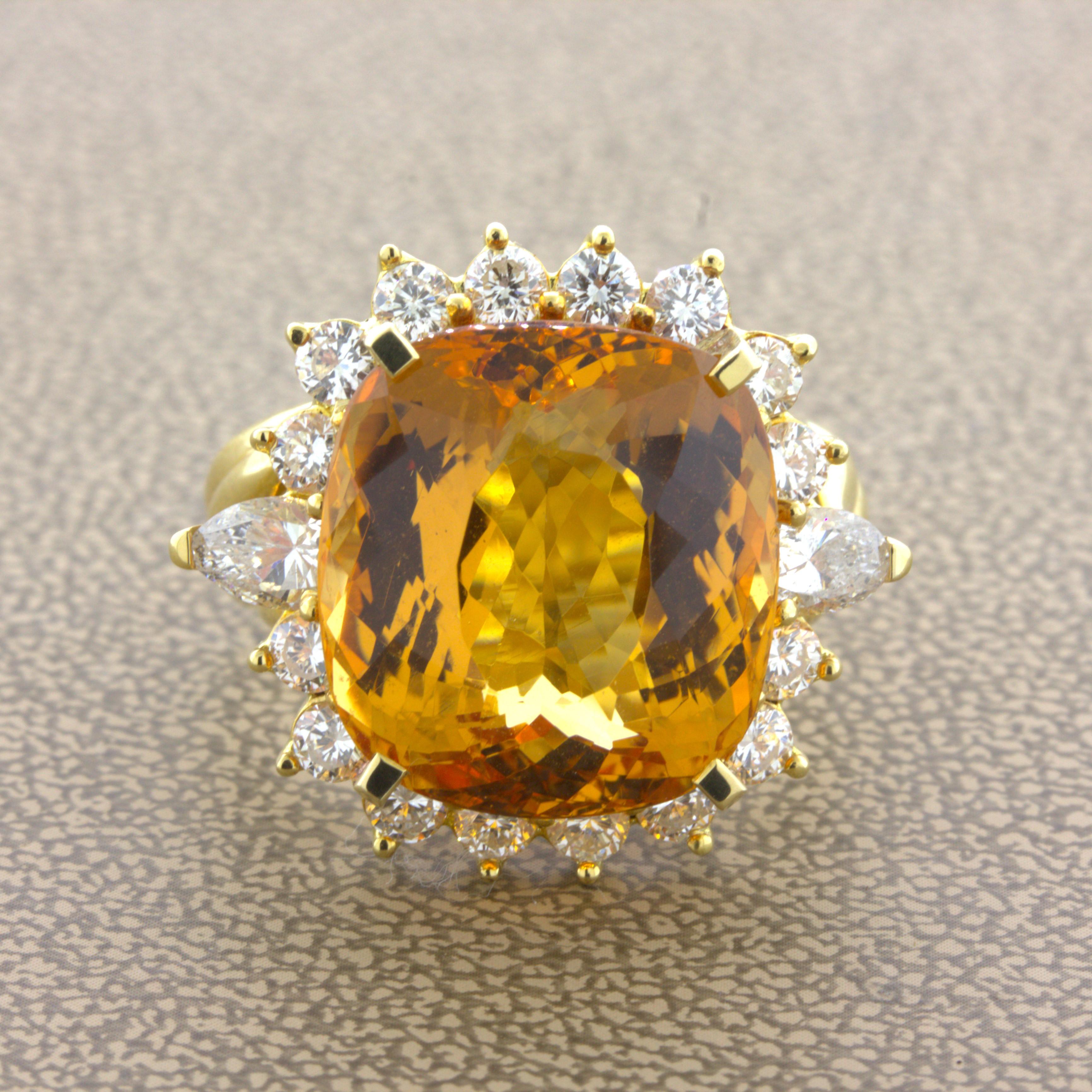 A rich, chic, and elegant ring featuring a very fine and rare imperial topaz. What makes the stone special is its combination of large size, 22.36 carats, and its very fine rich vivid golden orange color. Adding to that, the stone is extremely clean