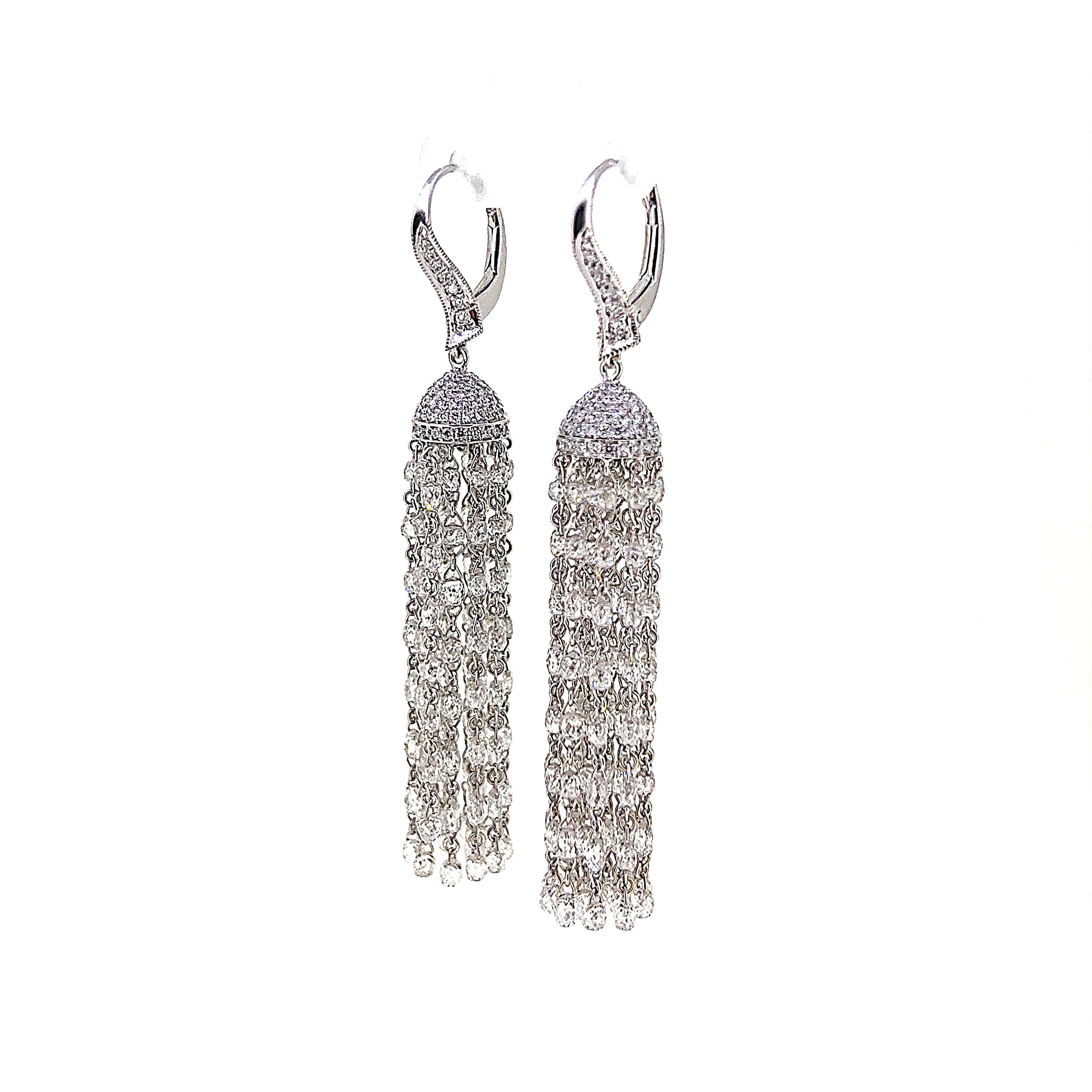 This is a stunning 1920 inspired Tassel Earrings weighing 22.37 carats in total.  This remarkable piece features 450 pieces of Briolette cut and Round Brilliant cut diamonds set on 18 Karat White Gold.  Extremely stylish and elegant is what set this